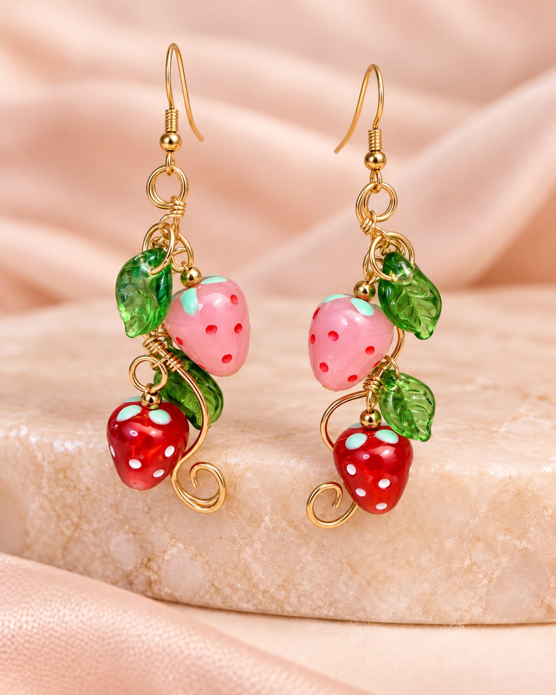 Handmade pink and red strawberry earrings by Legocita Makes
